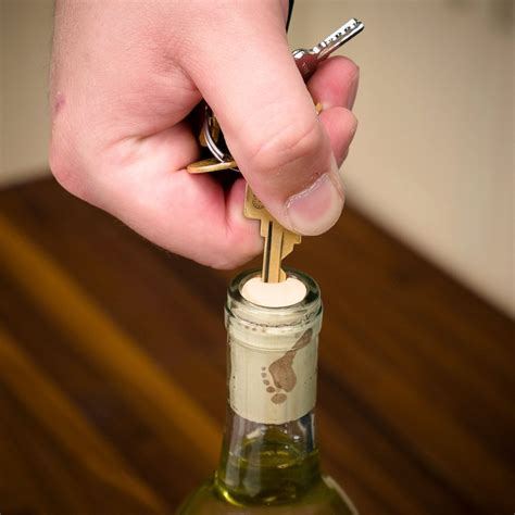 Tuck away the knife. Once the foil is removed, release the corkscrew, a.k.a. the worm, and place its tip in the center of the cork. (The closer to the center of the cork, the better your chances ...